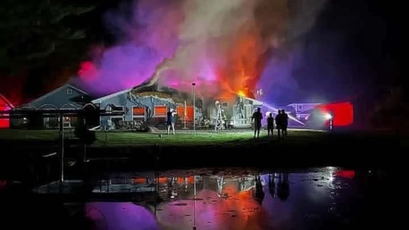 A group of teenage boys forced their way into a burning home on Rodney Drive in the town of...