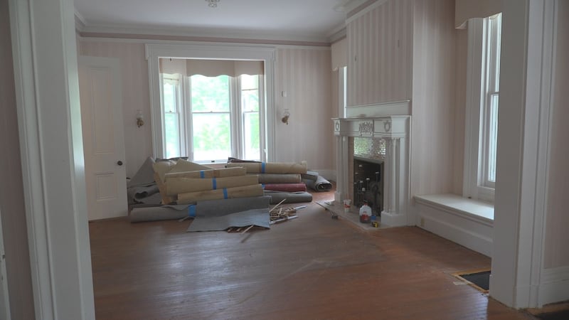 The carpet on the ground floor of the Lorenzo Bull House is being removed and the hardwood...