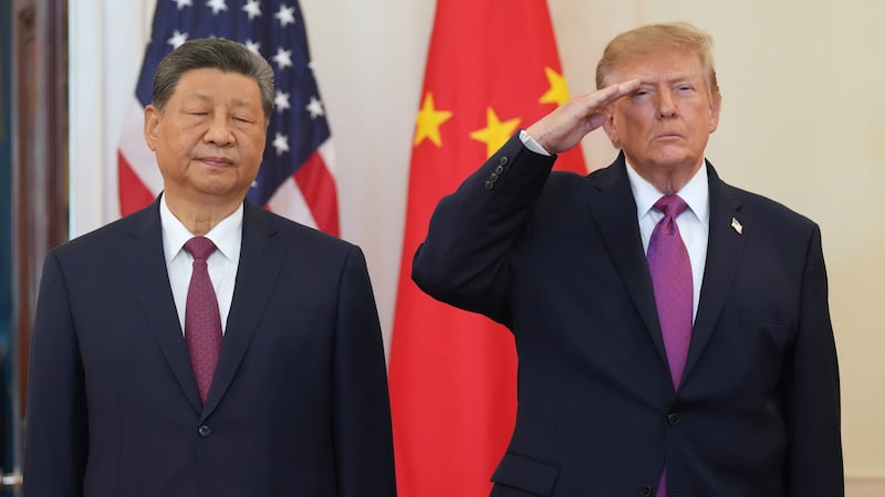 President Donald Trump and China's President Xi Jinping participate in an arrival ceremony in...