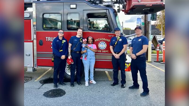 A baby who was delivered inside her home by Anchorage firefighters celebrated her first...