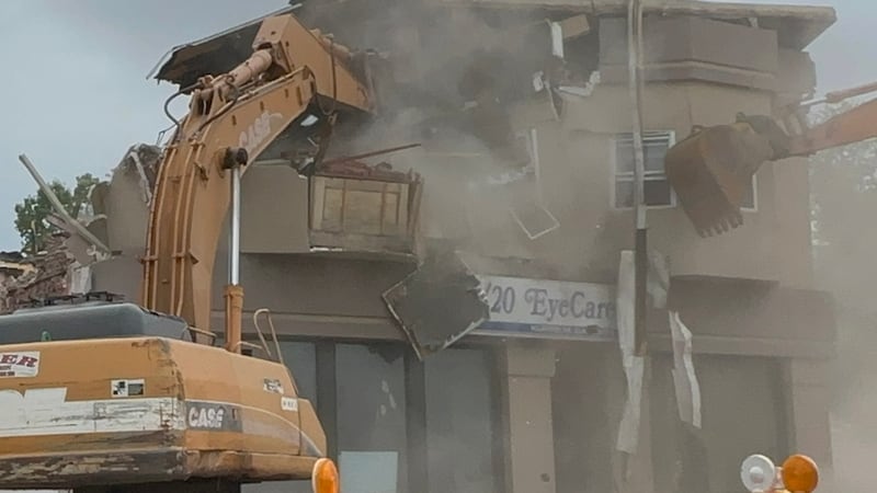 Wgem Building Crews demolish former 20/20 Eyecare building